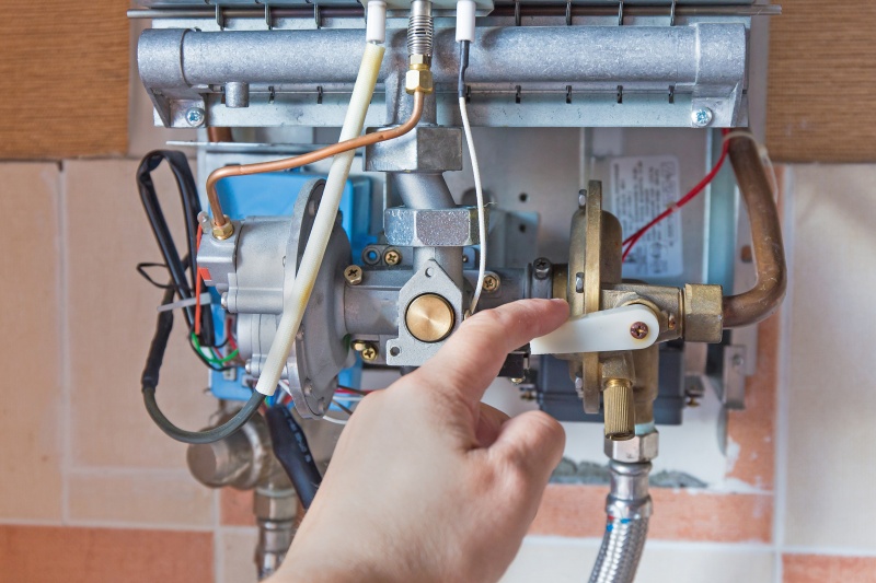 Plumbing and heating work in a Holland Park property